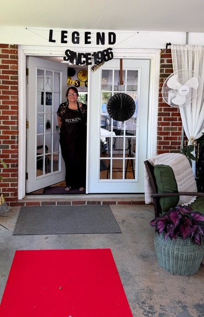 April at the studio door, 40th anniversary